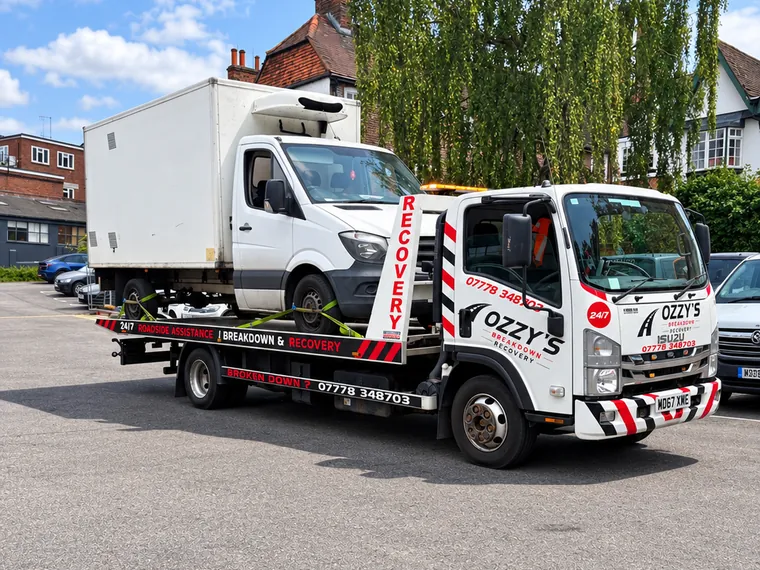 White box van loaded on the Ozzy’s Breakdown Recovery Isuzu truck